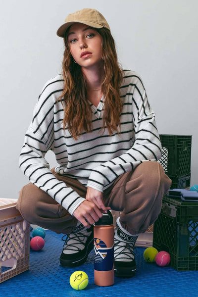 STRIPE EXPOSED SEAM SPLIT NECK KNIT TOP: CREAM