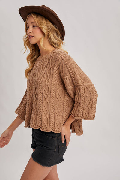 OVERSIZED BELL SLEEVE CABLE KNIT SWEATER