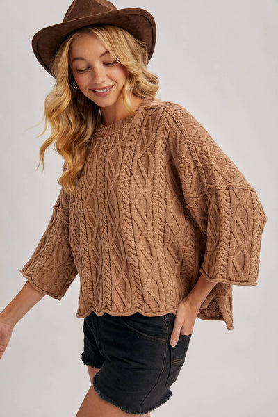 OVERSIZED BELL SLEEVE CABLE KNIT SWEATER