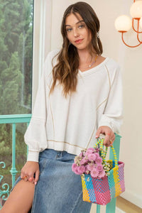 CONTRAST EXPOSED STITCH RIB KNIT TOP
